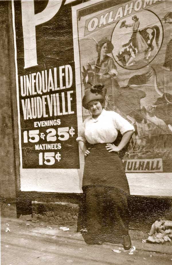 Goldie posed in front of billboard for Vaudeville show