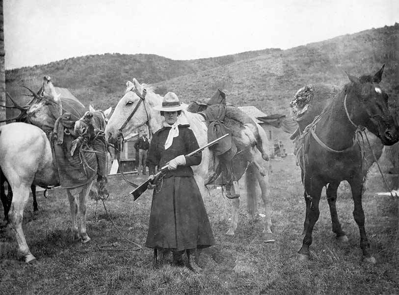 Photo of Martha Maxwell with horses