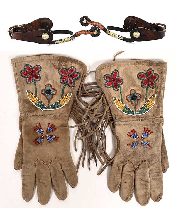 spurs and beaded gauntlets